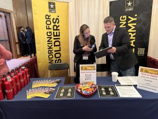 PEO EIS Human Resources personnel man the booth at a recent hiring event